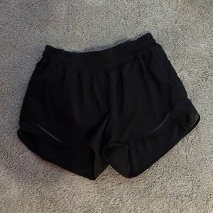 size 6 tall lululemon black hotty hot shorts
